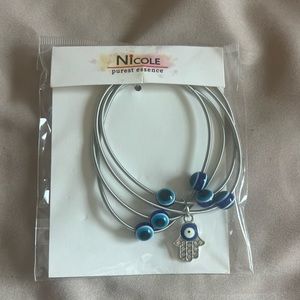 Evil Eye and Hamsa Coil silver tone Bracelets